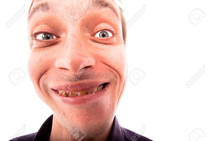11932130-detail-of-ugly-man-face-isolated-on-white-background-